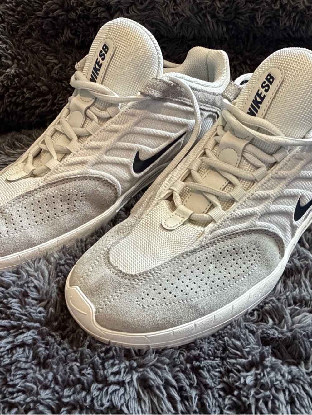 Nike white and black sneaker label visible - US 11